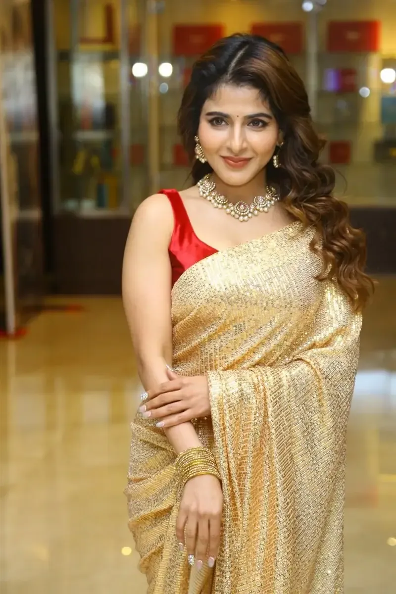 Iswarya Menon in Gold color Saree at Spy Movie Release Event